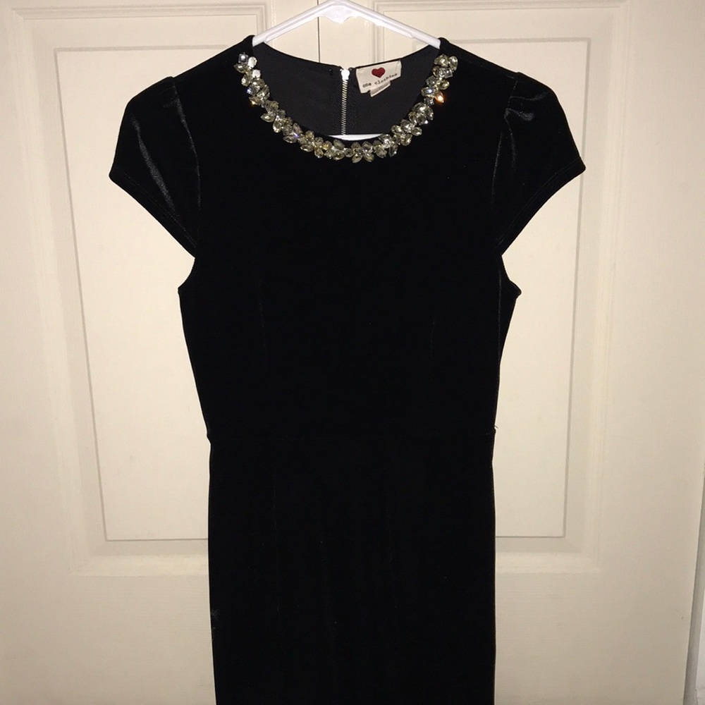 Black velvet dress with jewel neckline